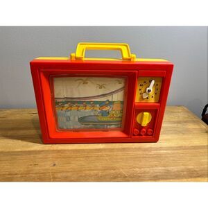 Vintage 1979 Blue Box wind-up musical toy television with moving screen